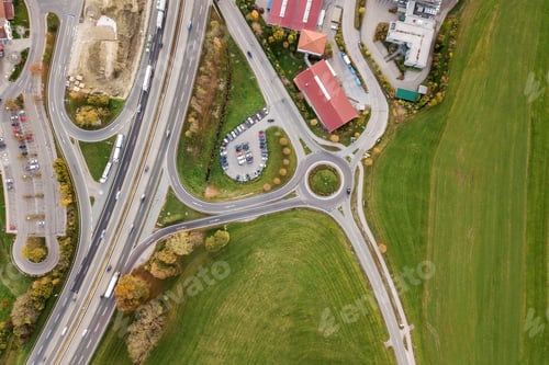 Preview: Top down aerial view of freeway interstate road with moving traffic cars in rural area.
