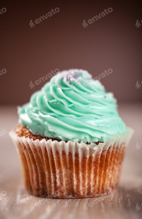 Preview: Colored Cupcake on Background.