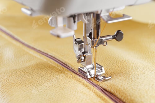 Preview: Modern Sewing Machine Special Presser Foot With Yellow Fabric And Zipper, Closeup