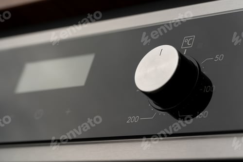 Preview: Modern oven mode control button close up