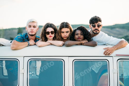 Preview: Young people standing in hatch of van roof