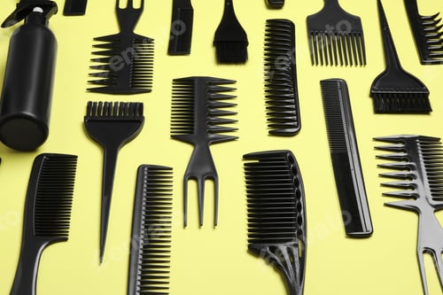 Preview: Composition with modern hair combs on yellow background, above view