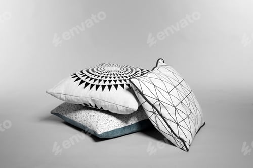 Preview: Pile of stylish decorative pillows on light background