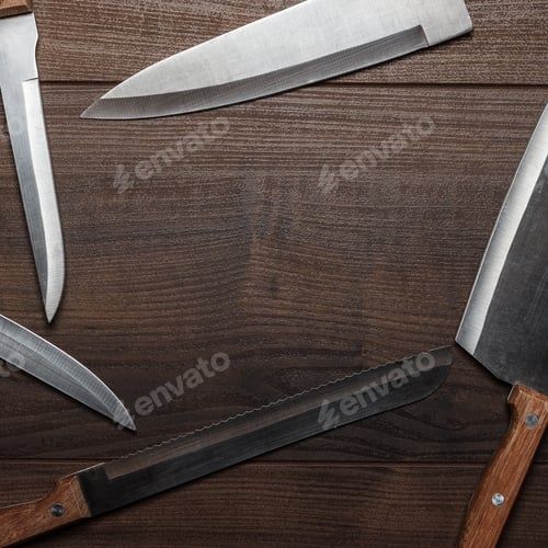 Preview: Kitchen Knifes On Brown Wooden Table Background
