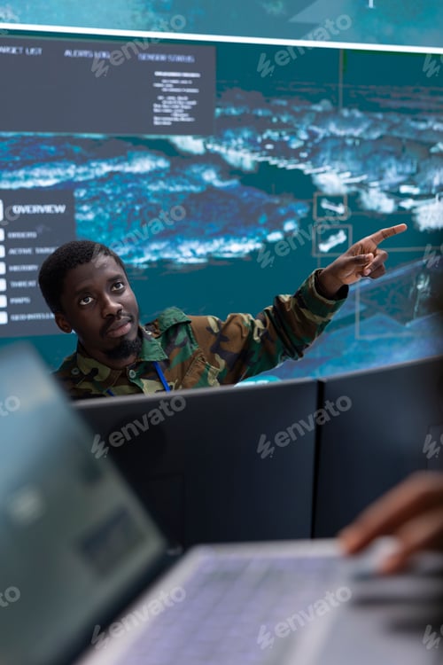 Preview: Army specialists use computer systems and big screen to gather intelligence