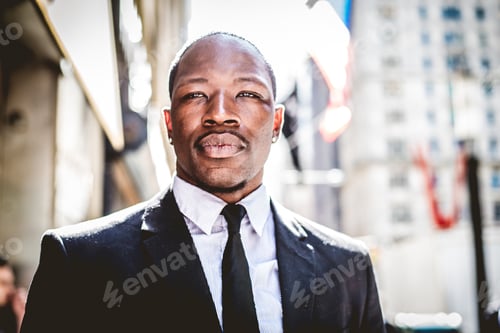 Preview: Confident businessman walking