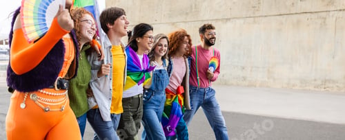 Preview: LGBTI community group of people having fun walking together outdoors.