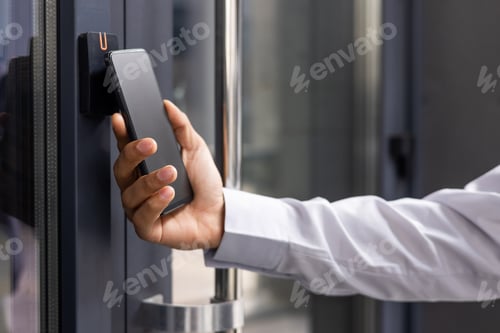 Preview: Hand man closely with the phone, the businessman uses the application on the smartphone to remove