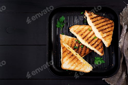 Preview: American hot cheese sandwich. Homemade grilled cheese sandwich for breakfast. Top view