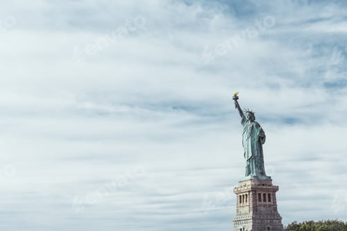 Preview: STATUE OF LIBERTY, NEW YORK, USA - OCTOBER 8, 2018: statue of liberty in new york against blue