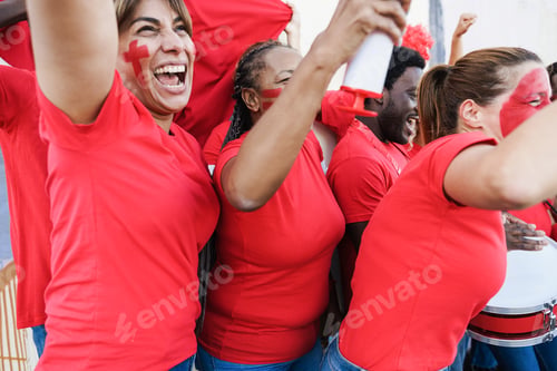 Preview: Multiracial red sport fans screaming while supporting their team