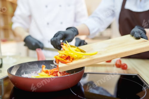 Preview: Chefs Cooking in Restaurant Kitchen