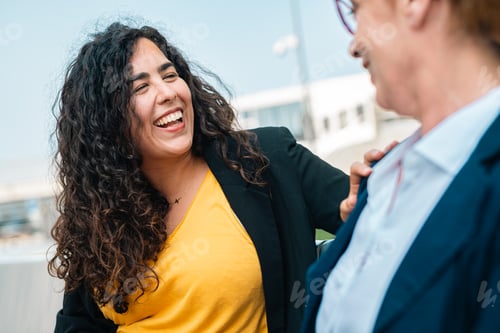 Preview: Business commuters sitting at sidewalk bench having,relaxed time,learning of seniors office concept