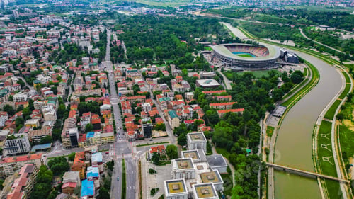 Preview: Aerial view of a river flowing through urban landscape in Skopje