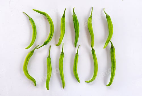 Preview: Cayenne pepper, Green chili pepper, Thai chili pepper arrangement on table