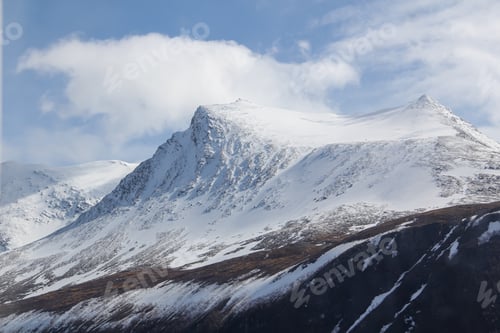 Preview: Landscape view in Norwegian fjords with mountains coved with snow for a natural travel background