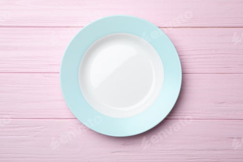 Preview: Stylish ceramic plate on wooden background, top view