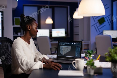 Preview: African american design arhitect working in 3D software developing prototype container idea