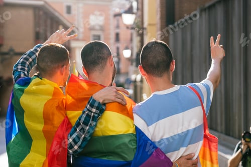 Preview: Backlit Sunset: Four Friends Embrace Diversity in Vibrant City Street Photo with LGBT Adornments