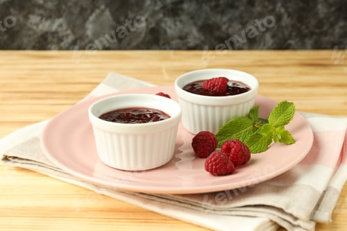 Preview: Concept of tasty food with raspberry jam on wooden table