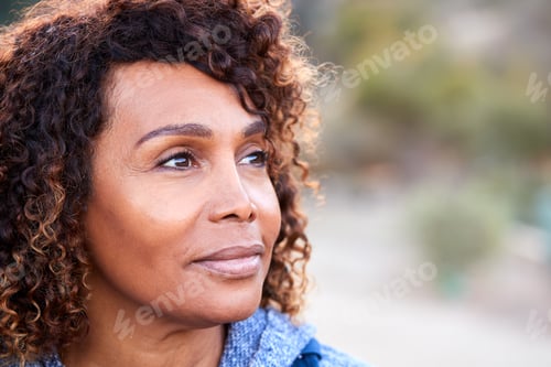 Preview: Outdoor Portrait Of Serious African American Senior Woman With Mental Health Concerns
