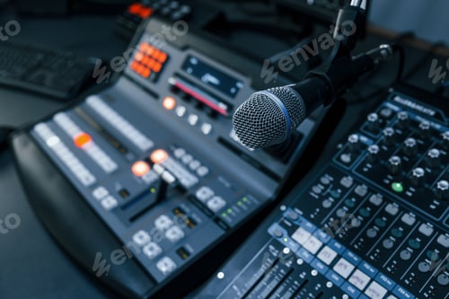 Preview: Close up view of radio mixing desk with professional sound equipment