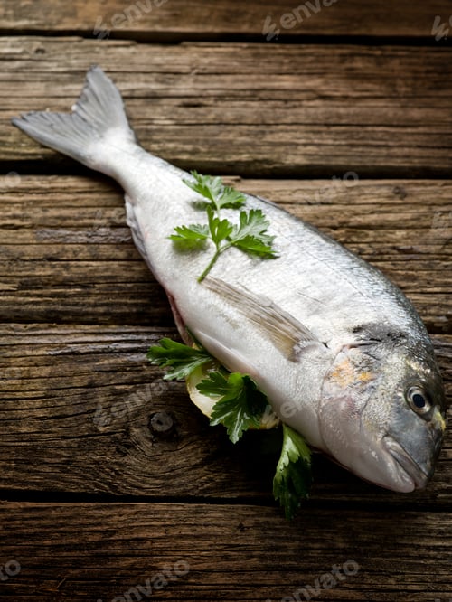 Preview: gilthead over wood ready to cooking