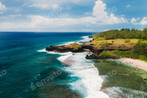 Preview: View of the famous Golden beach between black volcanic rocks on the banks of the Gris-Gris river, La