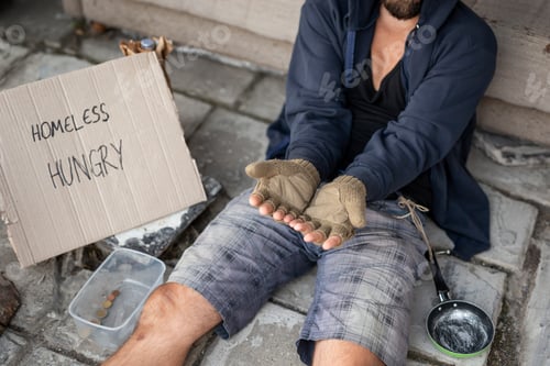 Preview: Beggar in the street