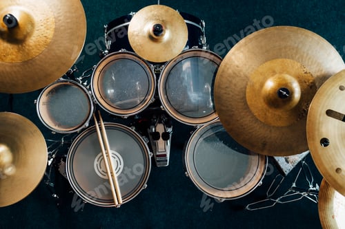 Preview: Top view complete drum set. Drumsticks on snare drum.