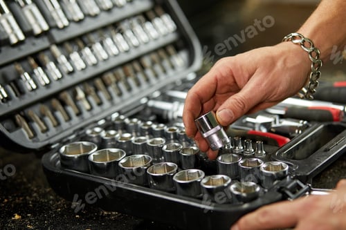 Preview: Man hand open set box with working tools