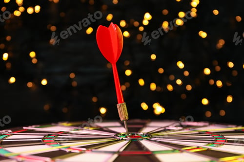 Preview: Darts hitting the target game at the party.