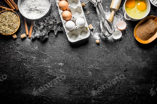 Preview: Baking background. Flour with cocoa, eggs and baking forms of the dough.