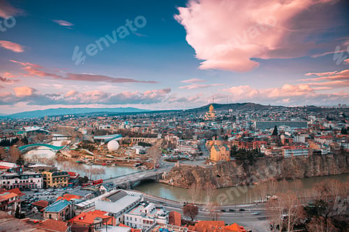 Preview: Tbilisi, Georgia. Top View Of Famous Landmarks In spring sunset Evening. Georgian Capital Skyline