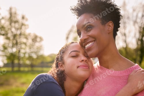 Preview: Loving Mature Mother With Teenage Daughter Enjoying Walk In Countryside Together