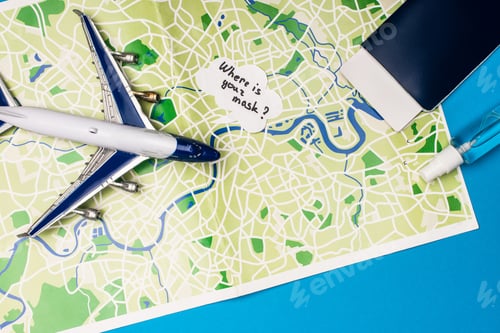 Preview: Top view of toy plane near speech bubble with where is your mask lettering near passport and bottle