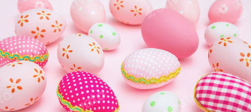 Preview: Happy Easter. Pink pastel color eggs variety on pink background