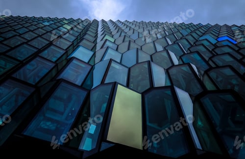 Preview: Low angle shot of a blue high rise brutalist architectural building