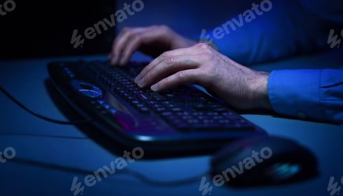 Preview: Hacker hacking the server in the dark room