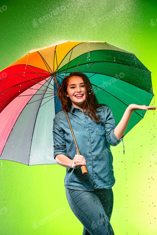 Preview: Young Beautiful Woman With An Umbrella.