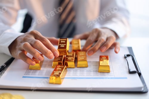 Preview: Gold Trading Businessman invest in trading gold, calculating profit price of buy and sell gold.