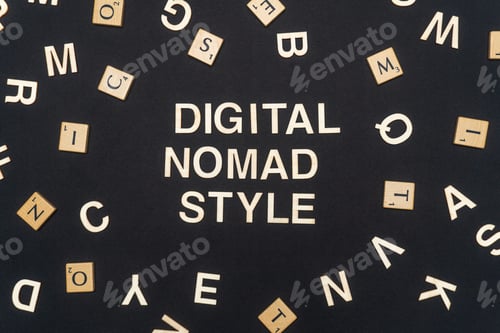 Preview: DIGITAL NOMAD STYLE word written on dark paper background. DIGITAL NOMAD STYLE text for your concept