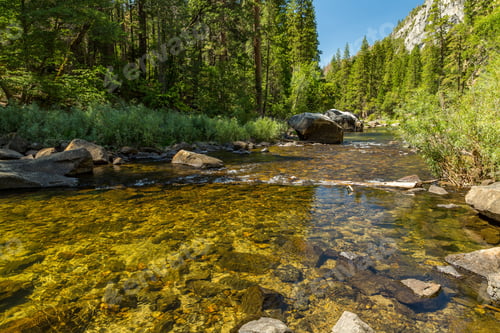 Preview: The Merced River In Yosemite Valley As It Flows From The Sierra Nevada To The San Joaquin Valley.