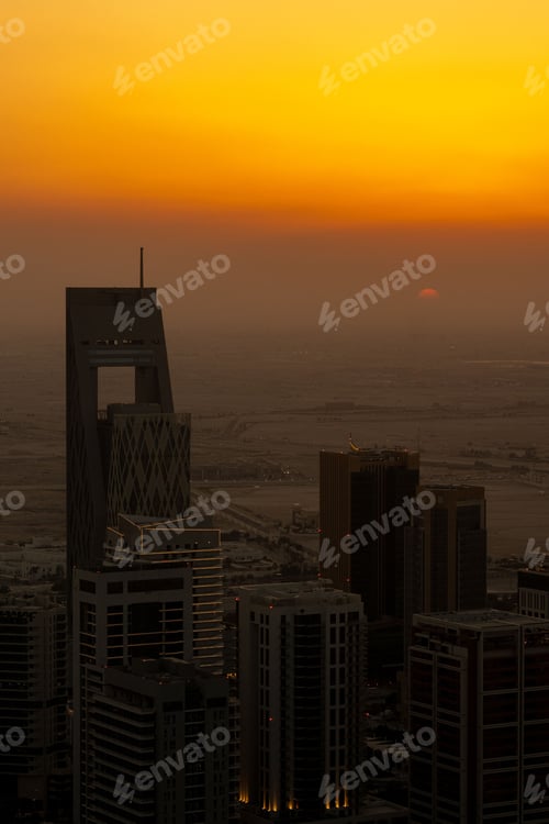 Preview: Doha cityscape at sunset with skyscrapers