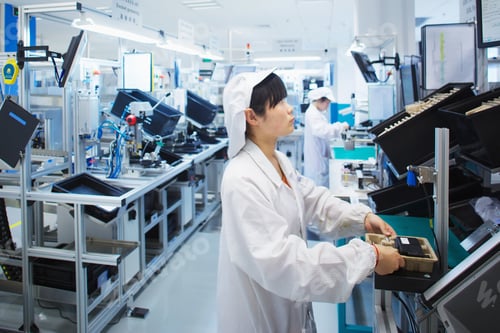 Preview: Worker at small parts manufacturing factory in China