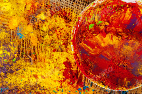 Preview: Bows of colorful Holi power close up on floor