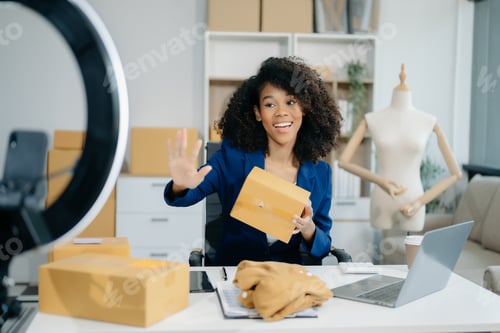Preview: Small business entrepreneur SME freelance woman working at home office, BOX,tablet and laptop