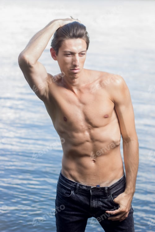 Preview: Bright White Sunlight Outdoors Model Posing Looking Sideways Water Background. Skinny Fit Slim