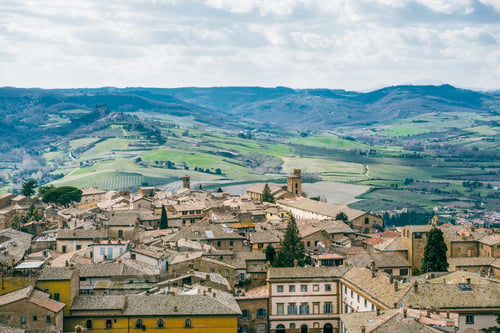 Preview: aerial view of buildings and green hills in Orvieto, Rome suburb, Italy