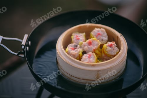 Preview: Steaming Bamboo Basket Filled with Delicious Dumplings